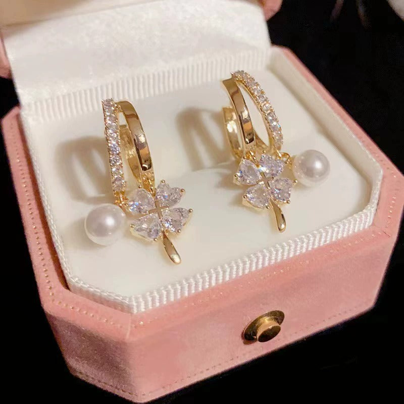 Fashion crystal four-petal flower pearl earrings