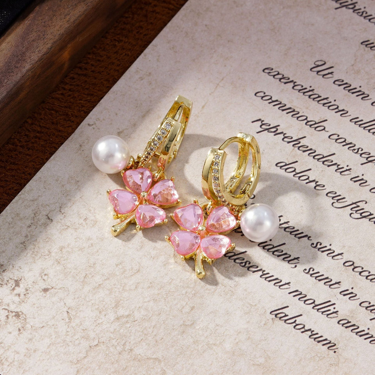 Fashion crystal four-petal flower pearl earrings