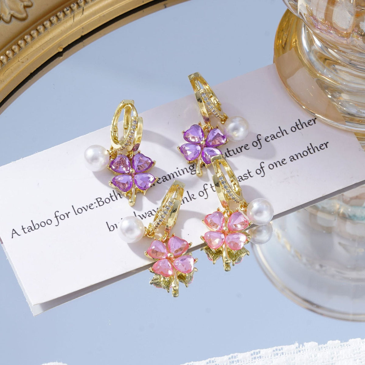 Fashion crystal four-petal flower pearl earrings